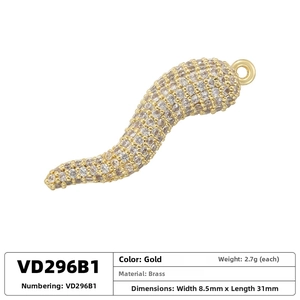 Detailed view of gold plated brass chili pendant with micro-paved white cubic zirconia