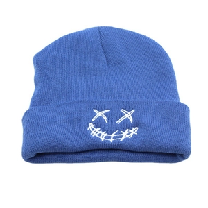 Blue knit beanie with white embroidered smiley face on folded cuff for winter