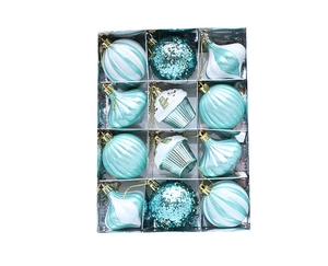 Set of 12 turquoise Christmas ornaments in a clear box with various shapes and glitter finishes