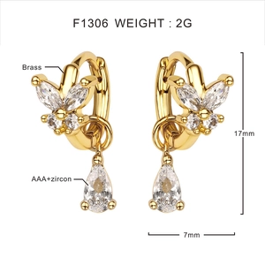 Detail showing gold butterfly earrings with AAA+ zircon measurements and specifications