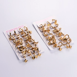 Boucles d'oreilles créoles papillon en acier doré 18K avec finition dépolie mate