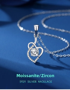 Macro shot of S925 sterling silver heart pendant with sparkling moissanite stone