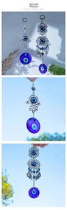 Detailed view of Hamsa Hand and Turkish Blue Evil Eye hanging amulets with glass charms