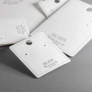 Premium white S925 silver jewelry display cards with hanging holes and minimalist design
