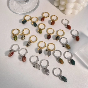 Boucles d'oreilles vintage en acier inoxydable avec pierres ovales et breloques étoiles