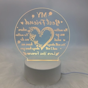Detail of warm glow acrylic night light with heart and best friend engraved text
