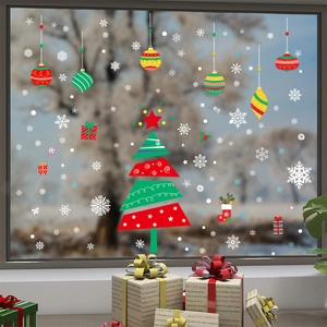 Christmas tree and snowflake static window stickers set with festive gift box scene
