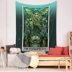 Detail of Cthulhu Hierophant tarot tapestry showing green gradient fabric on bedroom wall