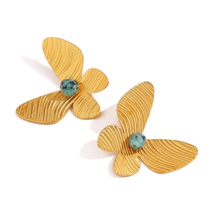 Retro 18K gold butterfly earrings featuring turquoise stones and radial texture finish