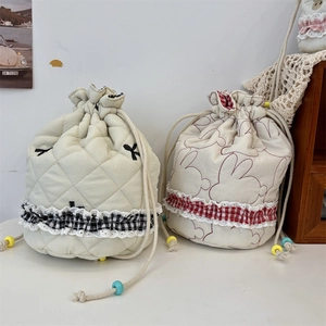 Quilted drawstring pouch set with cute embroidery and lace trim for storage