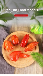 Detailed macro view of realistic faux roasted chicken and wing props on a wooden tray