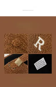 Detail of brown fleece baseball cap showing R letter embroidery and adjustable buckle