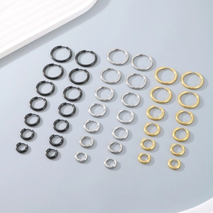 Detailed set of stainless steel hoop earrings in black, silver, and gold across various sizes