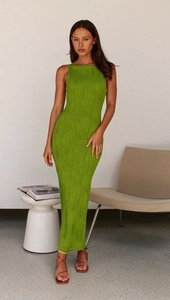Detail of lime green ruched texture fabric on a halter neck backless bodycon dress