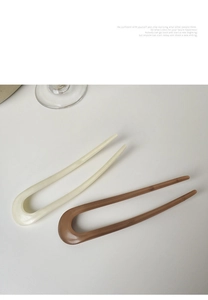 U-shaped hair pins in cream and brown resin for elegant hair styling buns