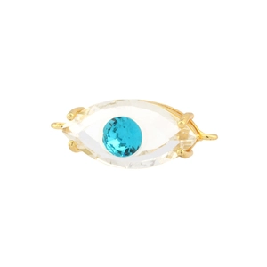 Macro view of gold-plated evil eye pendant with translucent facets and blue zircon