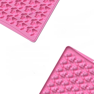 Detail view of pink 3D bunny silicone mold with thick edges for holiday baking