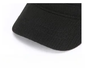 Close-up of a thick black reinforced cap brim with durable double stitching detail