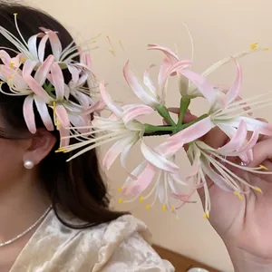 Elegant red spider lily hair clip with pink gradient petals and pearl accents