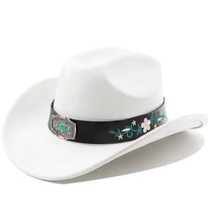 Detail of white felt cowboy hat featuring floral embroidery and turquoise silver buckle