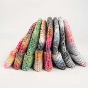 Chunky ribbed knit tie-dye beanie for women with gradient colors and foldable cuff