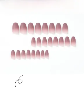 Detailed view of matte grape purple gradient press-on nails in trapezoid coffin shape