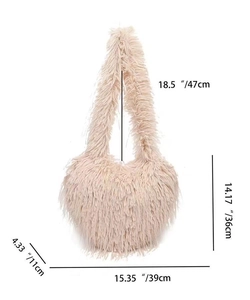 Detailed dimension chart showing size specs for the plush heart crossbody bag in beige