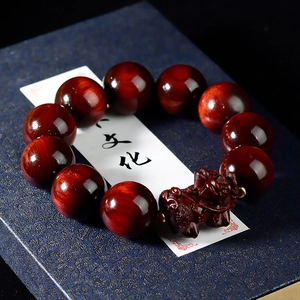 Bracciale in palissandro con intaglio Pixiu e distanziatori dorati su confezione regalo