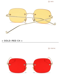 Detail view showing back and front of gold rimless sunglasses with red and yellow lenses