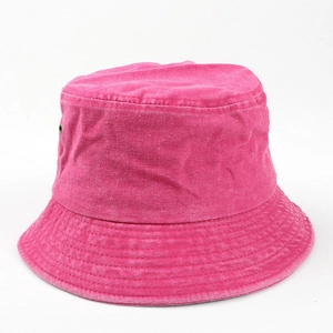 Detail view of cotton bucket hat with reinforced brim stitching and metal eyelet