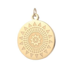 Golden stainless steel sun totem pendant with intricate circular geometric engravings