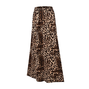 Detail of high waisted leopard print maxi skirt featuring an elastic waistband and soft fabric