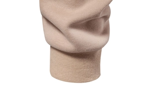 Macro view of beige sweatshirt ribbed cuffs and high-quality fleece material detail