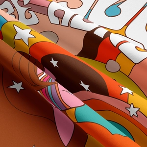 Macro shot of retro psychedelic tapestry fabric showing fine texture and vivid colors