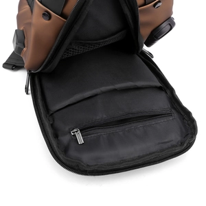 Internal view of waterproof chest bag showing zipper pocket and mesh compartment