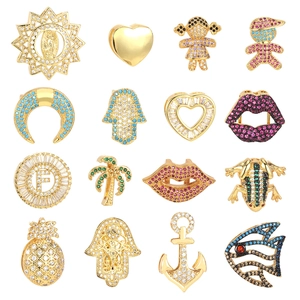 Gold-plated charms with micro-paved cubic zirconia in various shapes and colorful crystals