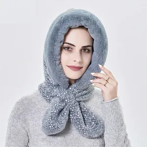 Women's grey hooded scarf featuring plush faux fur and knitted polka dot accents