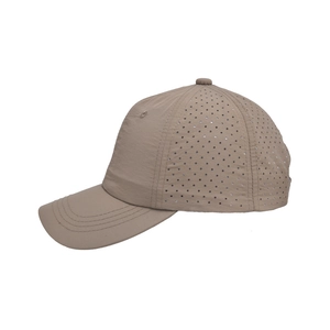 Detail of laser-cut ventilation holes and quick-dry fabric on the khaki baseball cap