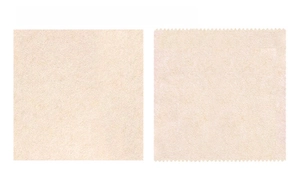 Detail view of loofah dishcloth showing straight and scalloped edge cutting options