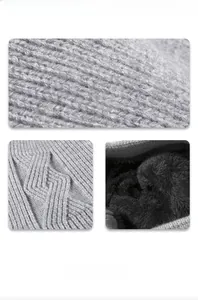 Close-up of gray jacquard knit texture and warm black fleece lining for men's winter beanie