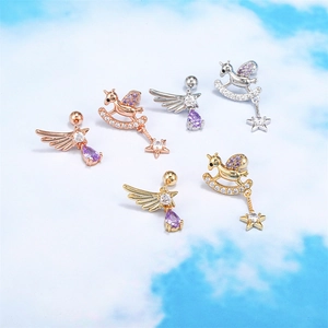 Asymmetric stainless steel earrings with angel wings and rocking horse stud designs