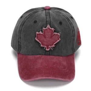Detailed view of washed cotton baseball cap with 3D embroidered maple leaf patch