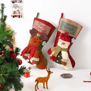 Large vintage Christmas stockings with 3D reindeer and snowman in festive scene