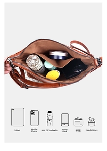 Detail view of the brown vintage tote bag showing its spacious multi-compartment interior