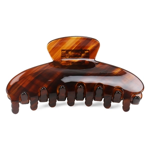 Classic brown tortoiseshell pattern hair claw clip made of glossy acetate resin material