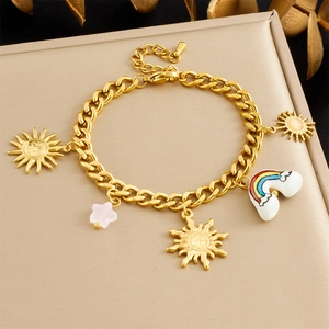 18K gold plated stainless steel bracelet with sun, rainbow, and star pendants
