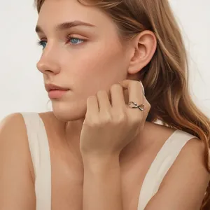 Elegant S925 sterling silver infinity ring with gold and silver dual-tone finish on finger