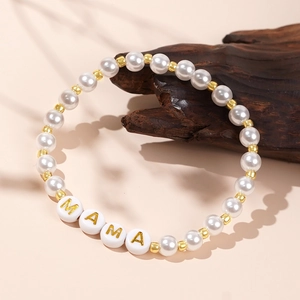 Elegant Mother's Day pearl bracelet with MAMA letter beads and golden metal accents