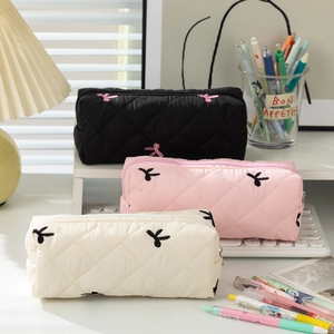 Quilted floral pencil cases with cute bow embroidery in black, pink, and white styles