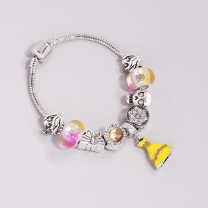 Silver snake chain bracelet with green floral glass beads and yellow dress charm